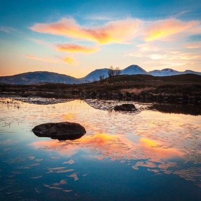 Sunset over the Black Mount from Loch Ba, Rannoch Moor, Scotland.