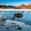 Ice-covered grass on the edge of Lochan na h'Achlaise, Rannoch Moor, Scotland. HC010