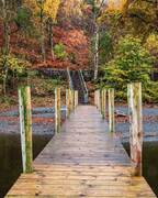 Wooden jetty in Barrow Bay on Derwent Water, near Keswick, Cumbria, England.