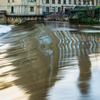Salts Mill and the River Aire, Bradford, West Yorkshire, England