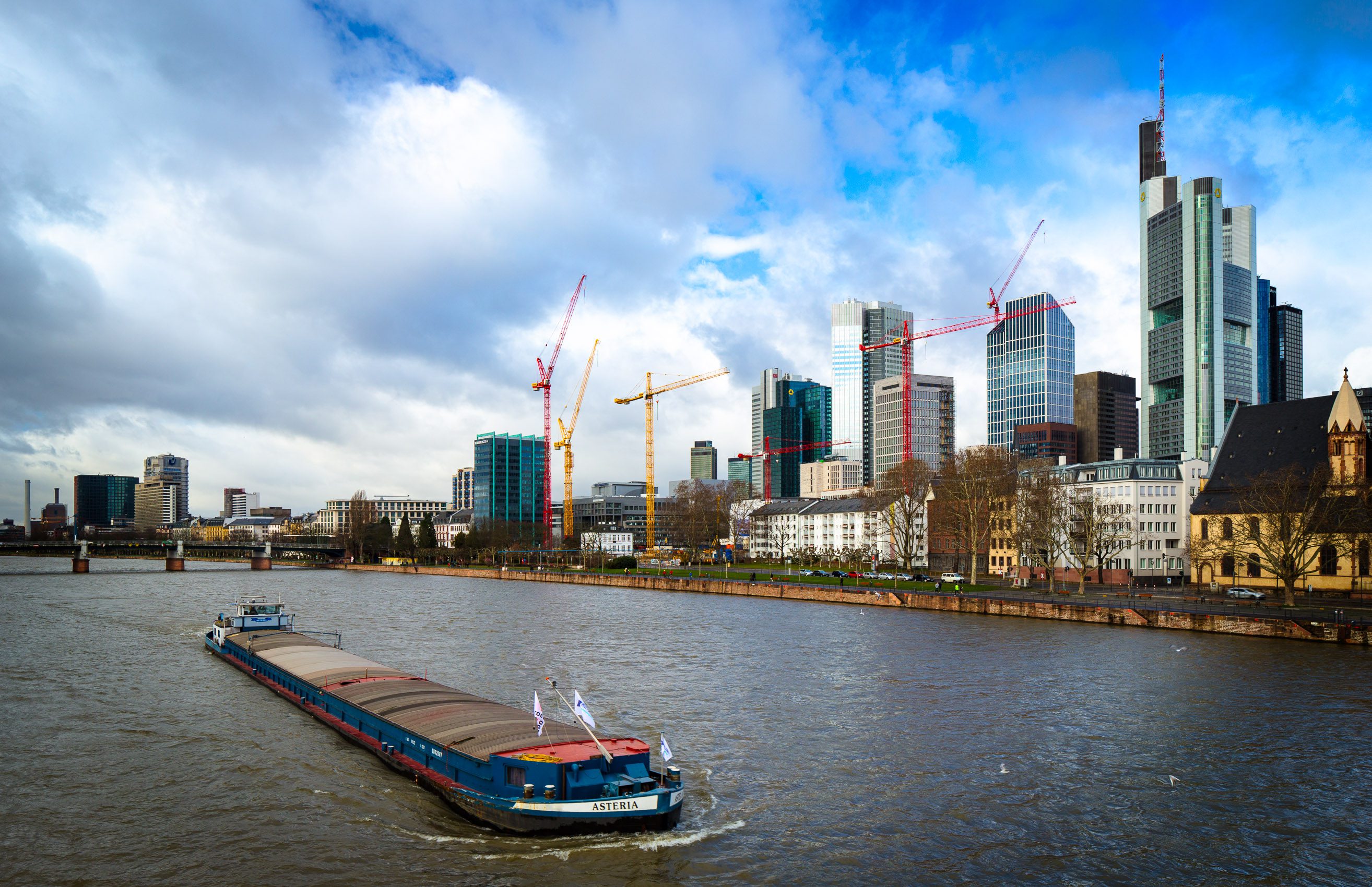 Barge travelling up the Main through Frankfurt's financial district. FF001