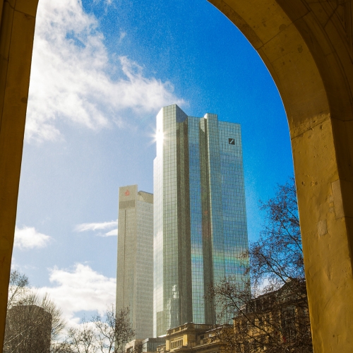 Financial business towers in Frankfurt am Main, seen through a veil of rain from the arched portico of the Alte Oper. FF006