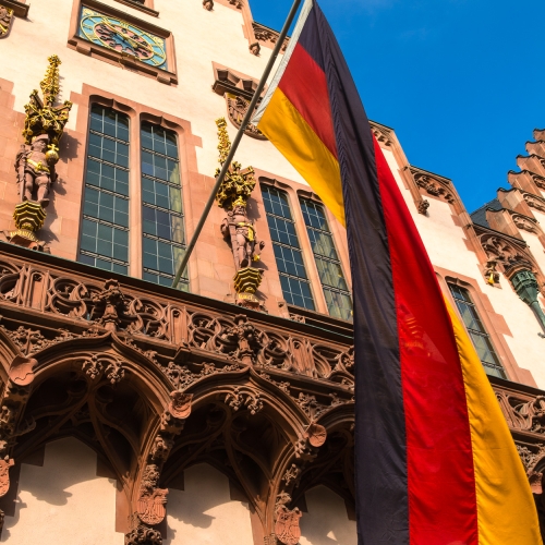 German flag outside the reconstructed Romer building, the ancient town hall of Frankfurt am Main, Hesse, Germany. FF013