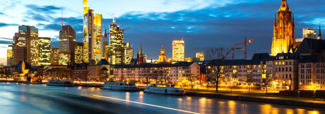 Dusk on the Main as a barge passes in Frankfurt am Main, Hesse, Germany FF021