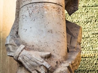 Josep Maria Subirachs sculpture of Jesus Christ at the base of Passion Facade of La Sagra Familia basilica. BC010