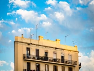 Upper part of apartment block in Barcelona, Spain. BC013