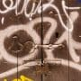 Graffitied door in Barcelona, Spain.