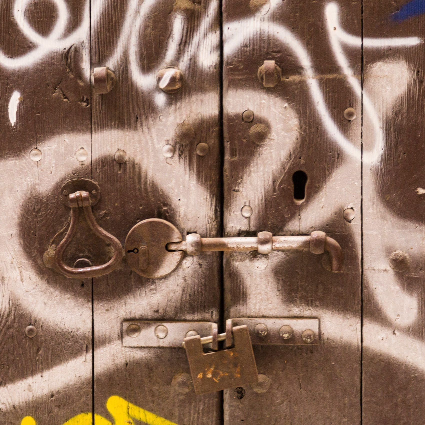 Graffitied door in Barcelona, Spain.
