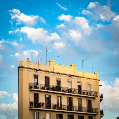 Upper part of apartment block in Barcelona, Spain.