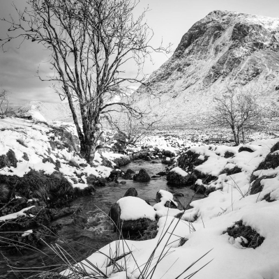 River Coupall and Buachaille Etive Mor in Snow, Glencoe, Scotland.
