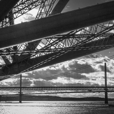 The three Forth Bridges from underneath the Rail Bridge, North Queensferry, Scotland.