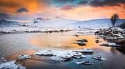 Wintry dawn over the Black Mount and the River Ba, Rannoch Moor, Scotland.