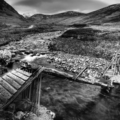 Collapsed footbridge in Glen Isla, Angus, Scotland.