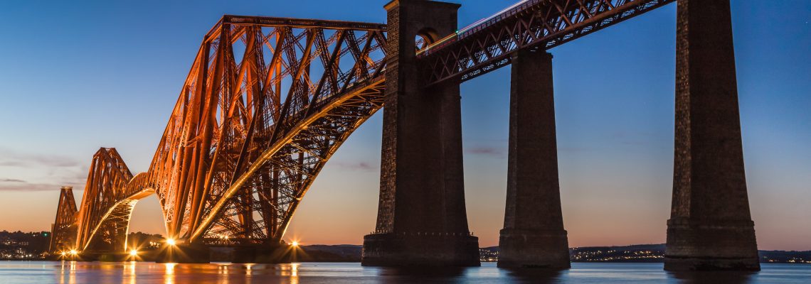 The Forth Rail Bridge at dusk from South Queensferry, West Lothian, Scotland, United Kingdom. FB009