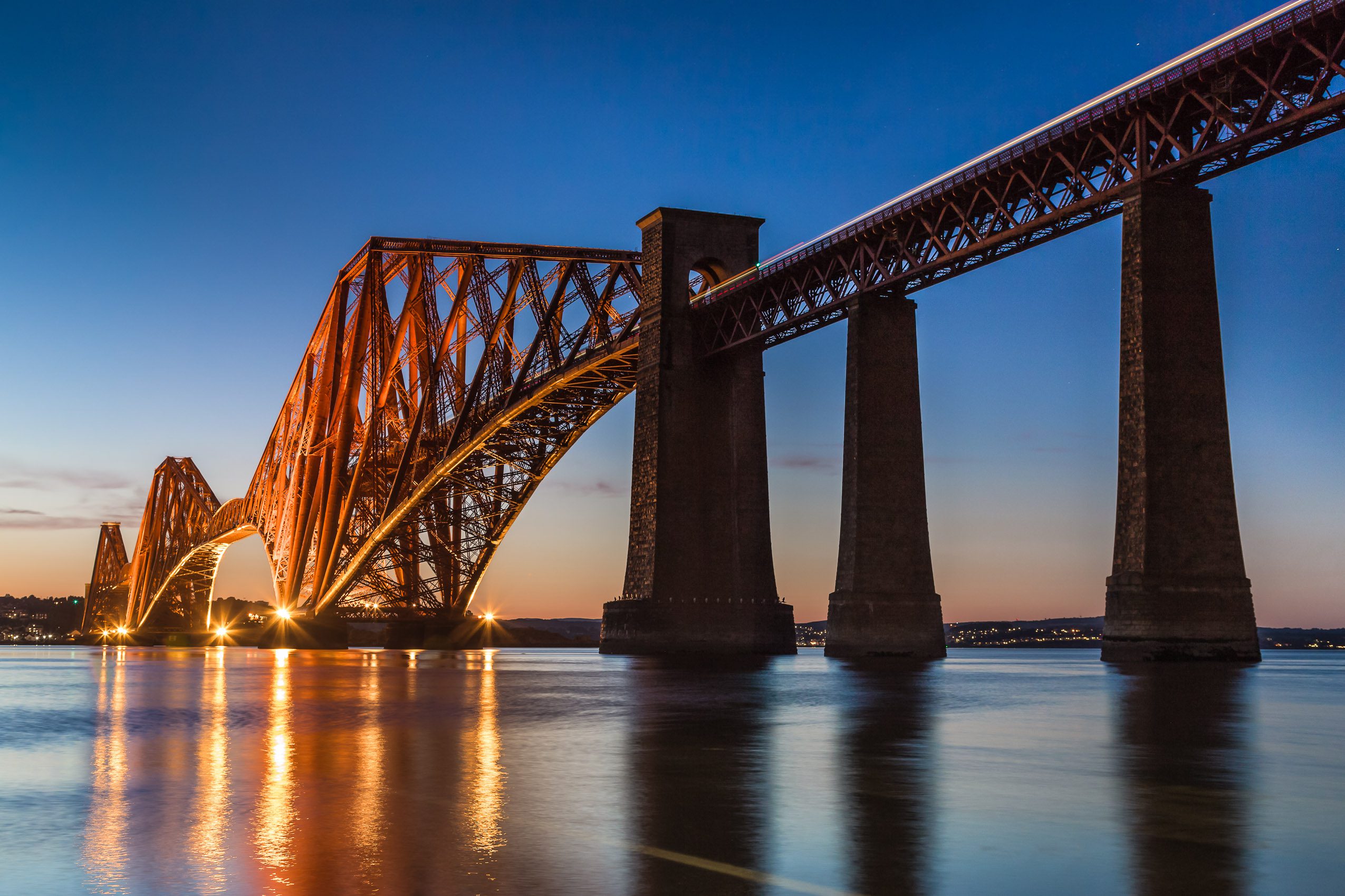 The Forth Rail Bridge at dusk from South Queensferry, West Lothian, Scotland, United Kingdom. FB009