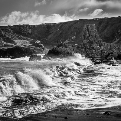 Waves and rocks at Tarlair, Moray Coast, Scotland.