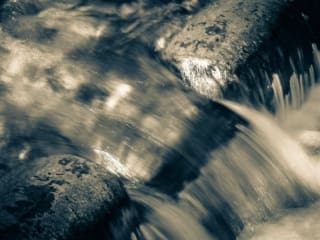 Cyan toned image of water detail, North Carolina, USA.