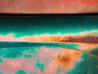 Corroded painted surface of a truck in Spruce Pine, North Carolina, USA. NC017