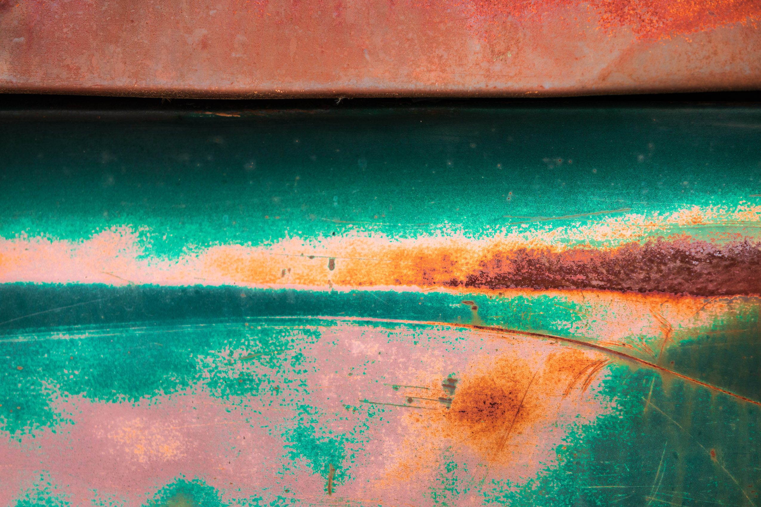 Corroded painted surface of a truck in Spruce Pine, North Carolina, USA. NC017