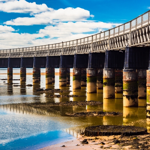 The Tay Rail Bridge at low tide from Dundee, Scotland. DD055