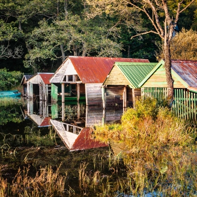 Boathouses on Loch Ard, The Trossachs, Scotland. TR001 Boathouses on Loch Ard, The Trossachs, Scotland.