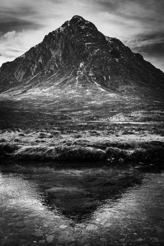 Buachaille Etive Mor casts a shadow in the River Coupall, Rannoch Moor, Scotland. SM026