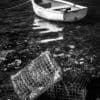 Moored boat and lobster pots, Connemara, Ireland. IM001
