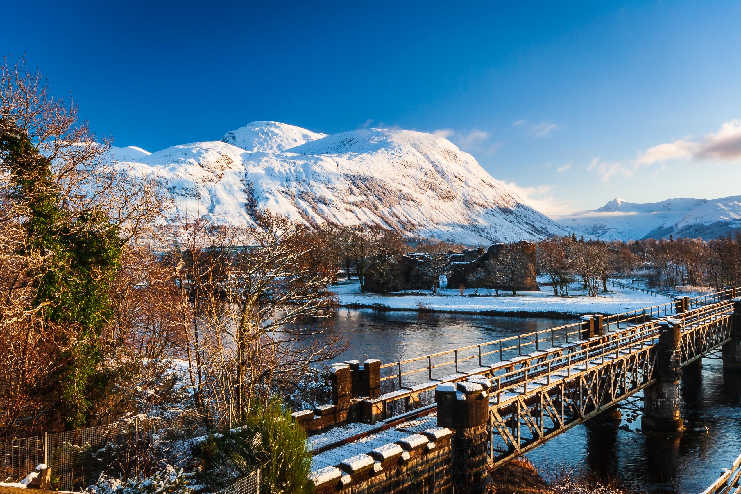 Ben Nevis and the railway bridge carrying the Mallaig Line over the River Lochy, Scotland. HC034