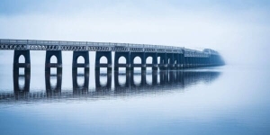 The Tay Railway Bridge in fog, from Dundee, Scotland. DD185