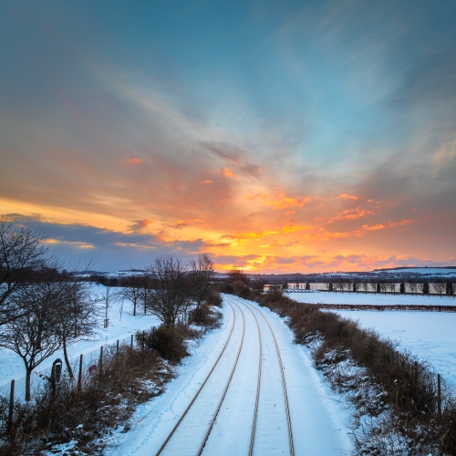 Winter sunrise over the Dundee to Perth railway line, Dundee, Scotland. DD135