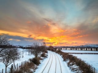 Winter sunrise over the Dundee to Perth railway line, Dundee, Scotland. DD135