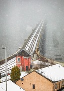 The south end of the Tay Rail Bridge disappearing into a snowstorm, Wormit, Fife, Scotland.