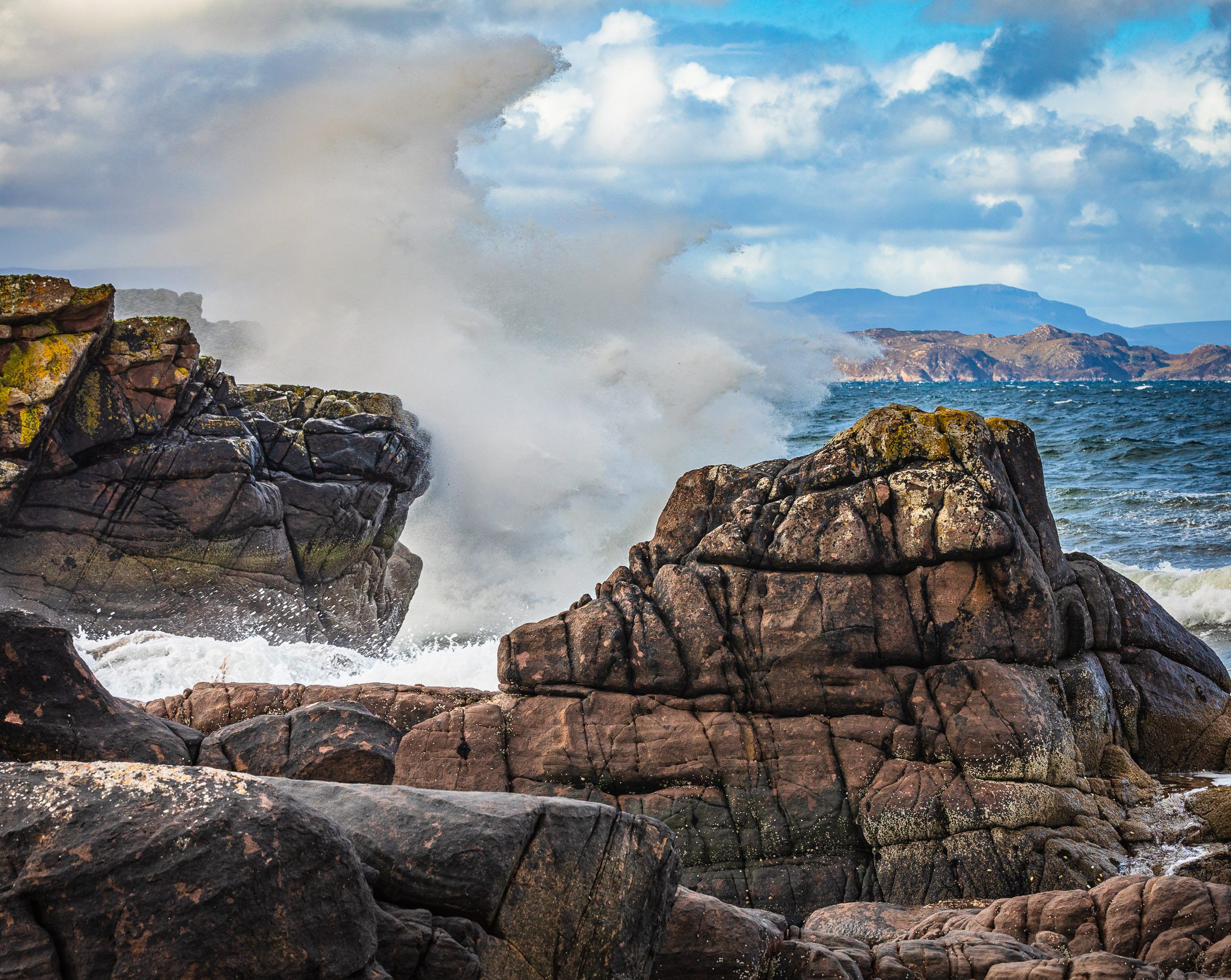 Breaking waves against the rocky shore at Lonbain, Applecross, Scotland. AP030