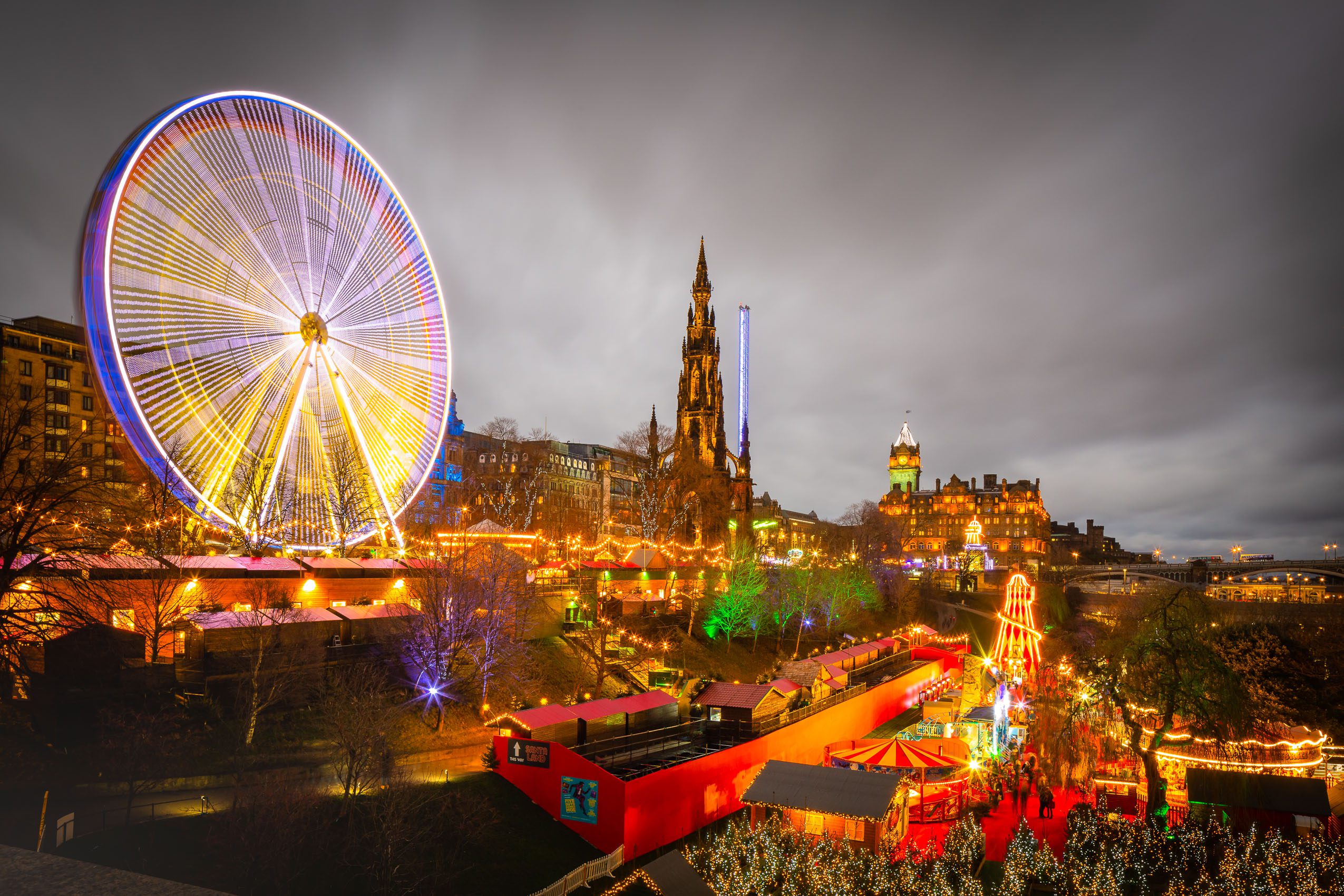 Giant Ferris Wheel and other attractions in Princes Street Gardens on New Years Day, Edinburgh, Scotland, EH007