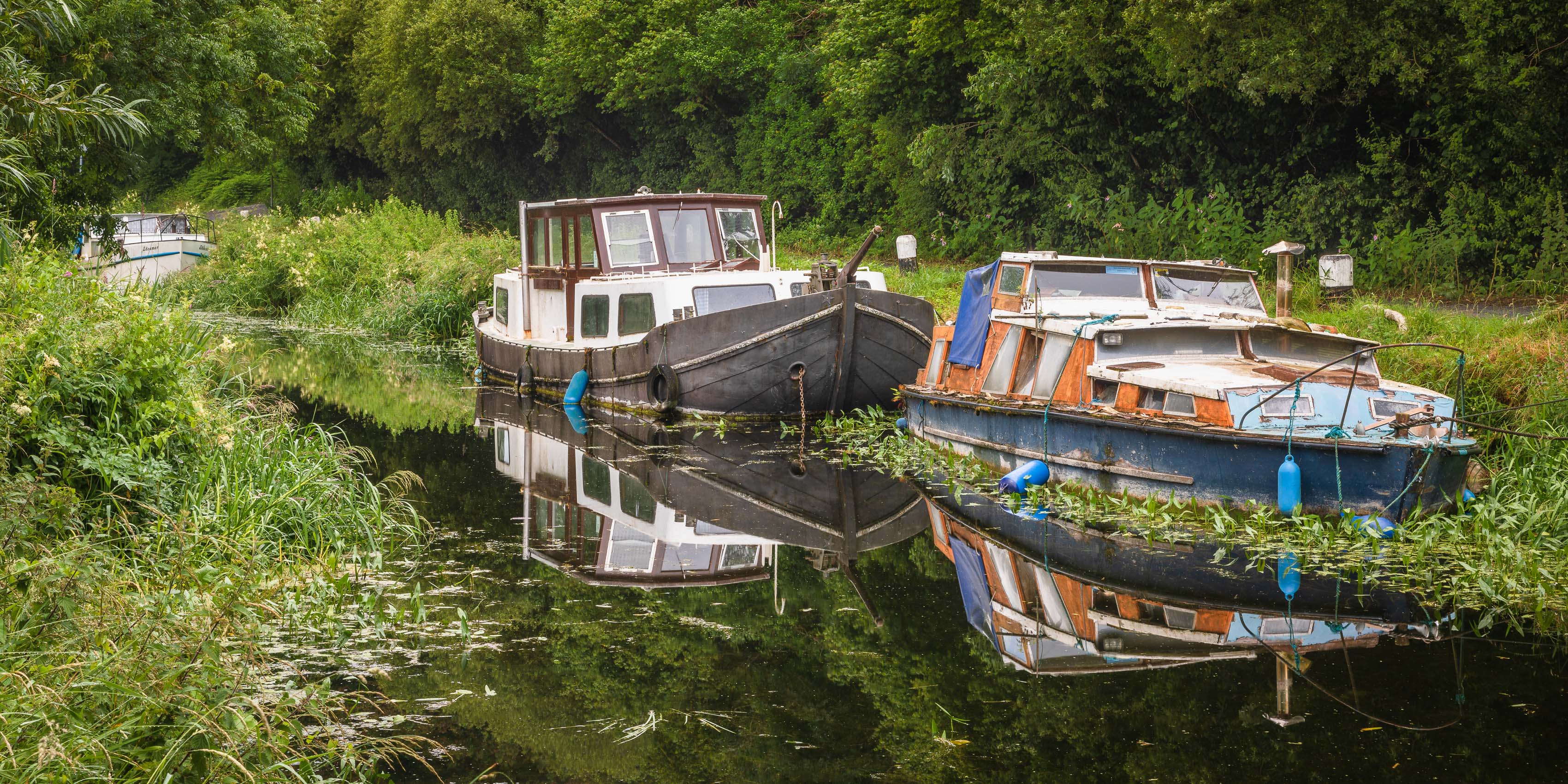 Boats on a lateral canal of the Barrow Navigation at St Mullin's (Tigh Moling), County Carlow, Ireland. BR003