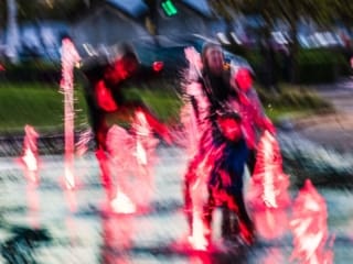 Children playing in the fountains at Dundee Waterfront, Dundee, Scotland
