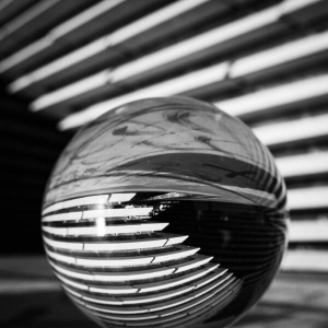 V&amp;A Dundee building reflected in a glass sphere, Dundee, Scotland. DM006