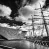 Monochrome (black and white) image of RRS Discovery and the V&A Dundee, Dundee, Scotland. DD023