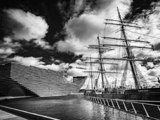 Monochrome (black and white) image of RRS Discovery and the V&amp;A Dundee, Dundee, Scotland. DD023