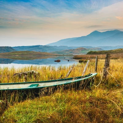 Boat moored by Loch Tromlee, Argyll. Scotland.