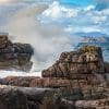 Breaking waves against the rocky shore at Lonbain, Applecross, Scotland.