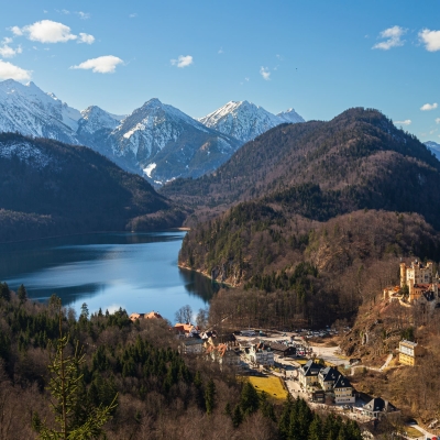 Hohenschwangau And The Austrian Alps, Bavaria, Germany.