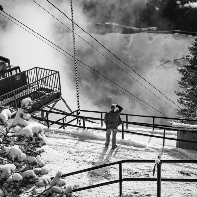 Man Viewing Walchensee From Top Station of the Herzogstand Cable Car, Bavaria